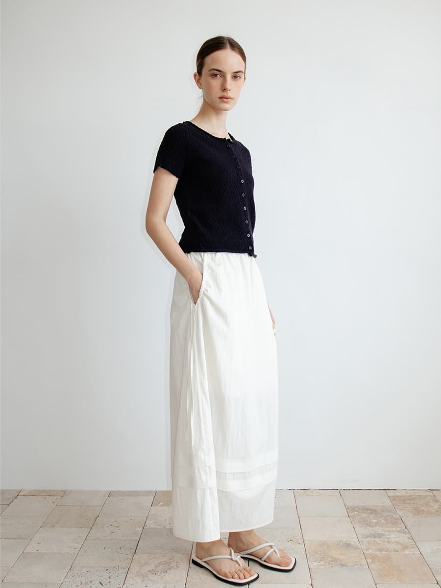 TIR TIERED TUCK FLARE SKIRT_IVORY