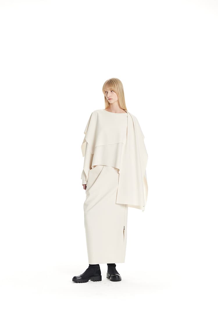 GDeL Less Line Asymmetrical Zip-Up Skirt (Cream) — vue 9