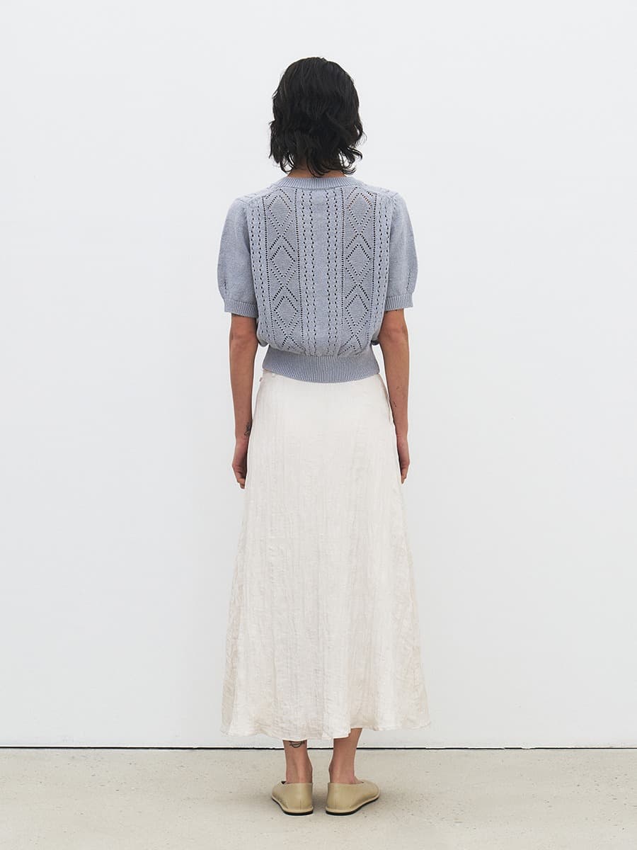 TFR CREASED SHEEN FLARE SKIRT_IVORY — vue 3
