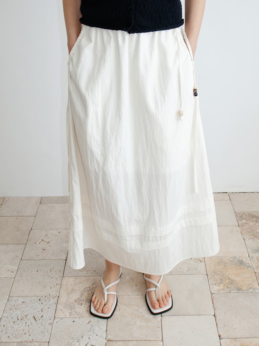 TIR TIERED TUCK FLARE SKIRT_IVORY — vue 2