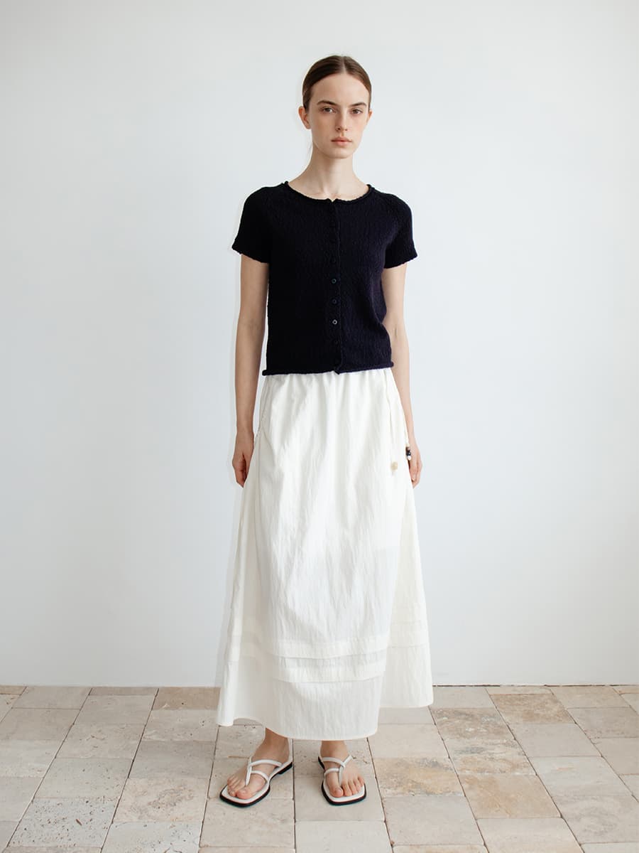TIR TIERED TUCK FLARE SKIRT_IVORY — vue 3